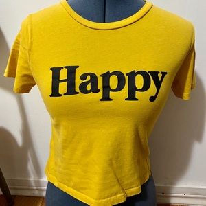 Yellow shirt with happy logo
